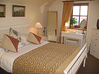 Master bedroom at The Coach House Cottage in the Derbyshire Peak District - Derbyshire and Peak District Accommodation