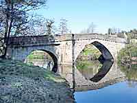 bridge over the river derwent in derbyshire at froggatt