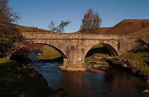 Photograph   from  the Upper Derwent Valley , Derbyshire  - slippery stones bridge